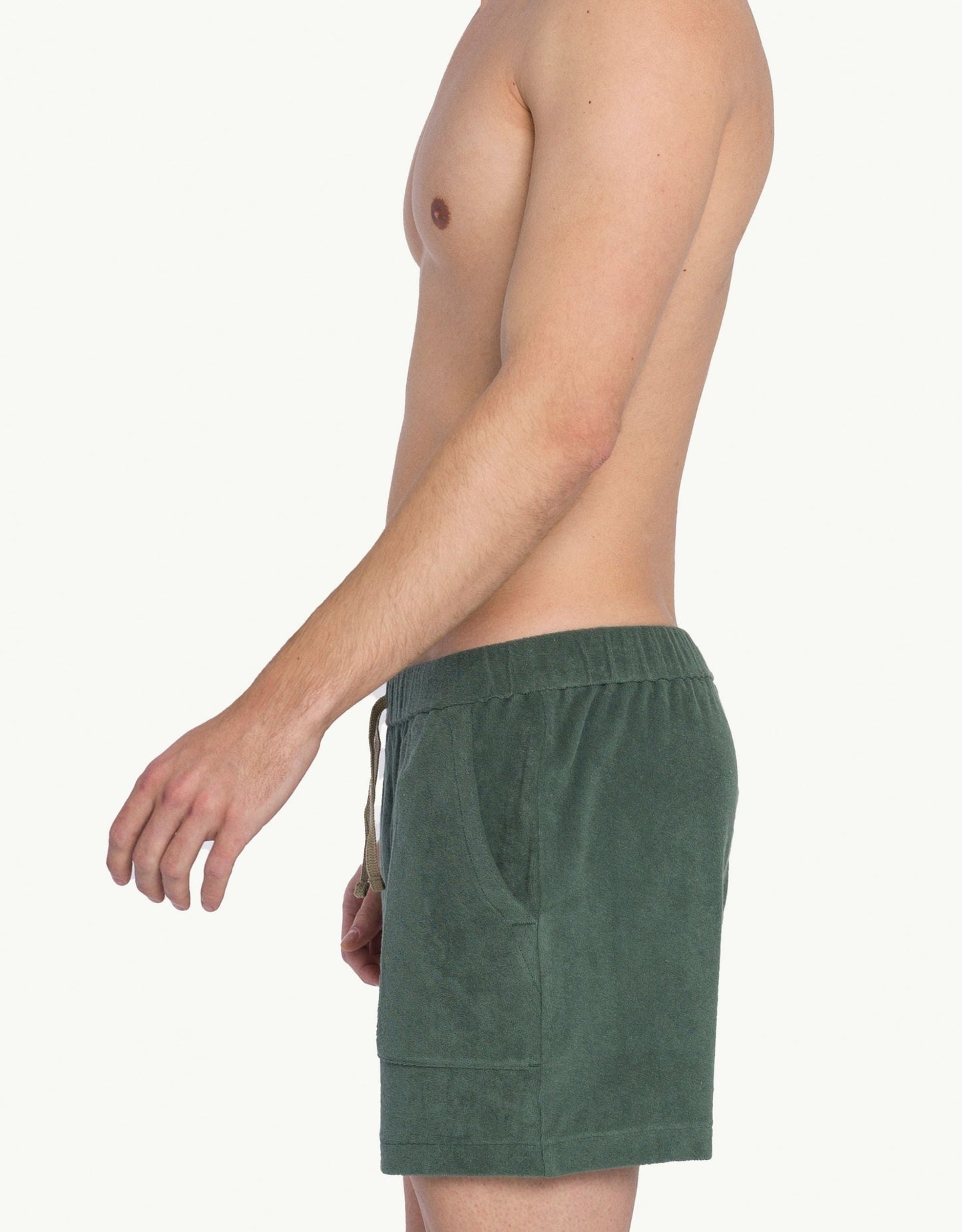 Versatile summer luxury shorts with a towel-like feel, ideal for beach getaways or nights out. Made from 100% certified organic cotton in green.