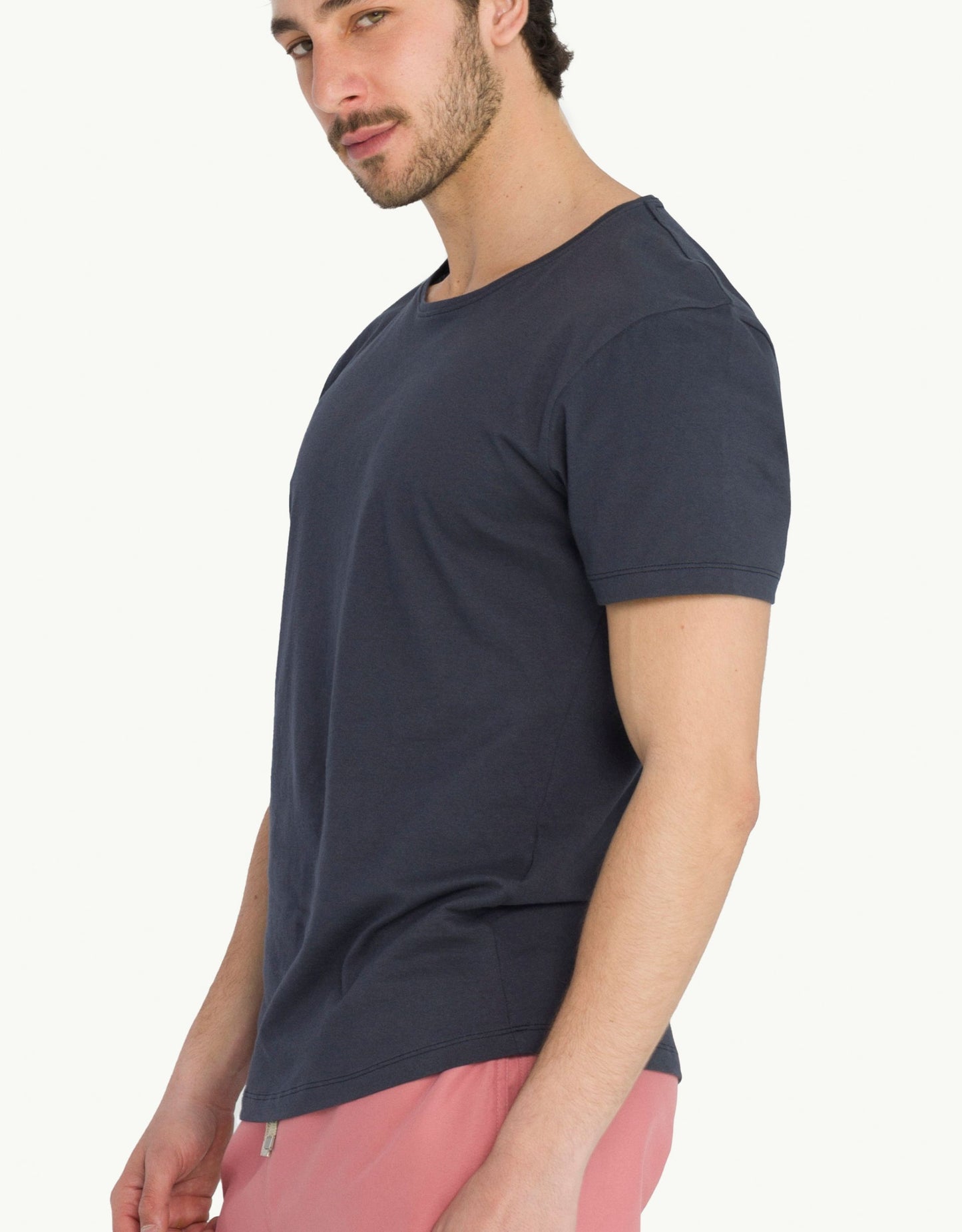 Explore sustainable fashion for men with our indigo color unku t-shirt. Crafted for everyday luxury, our tees provide unmatched softness and all-day comfort. Stay cool in our breathable organic cotton tees for men, made from 100% organic cotton to champion sustainability and skin-friendly choices.
