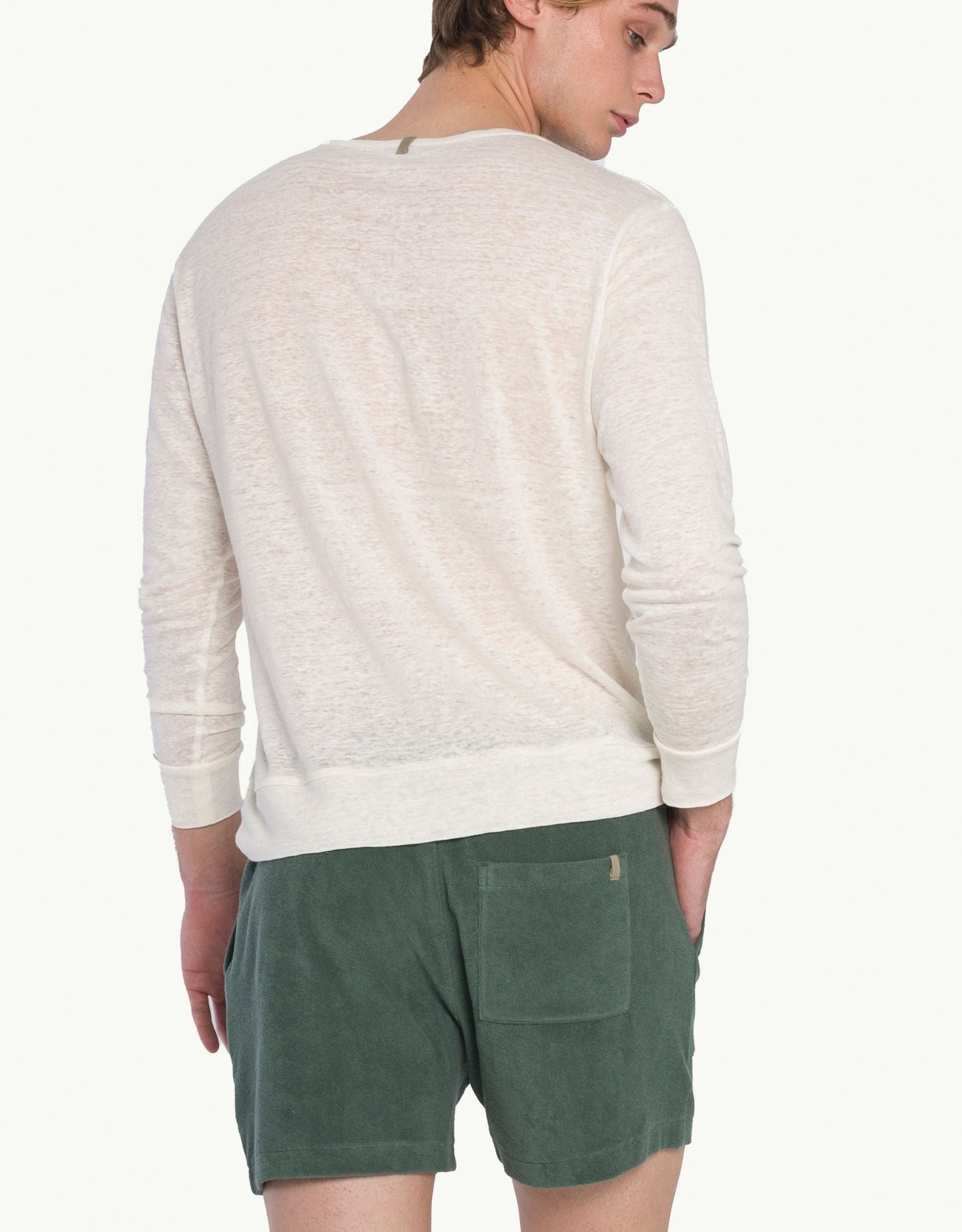 Versatile summer luxury shorts with a towel-like feel, ideal for beach getaways or nights out. Made from 100% certified organic cotton in green.