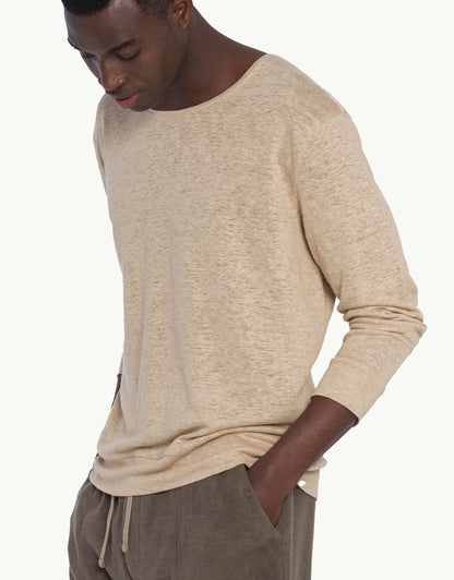 Discover luxury simplicity with our sand color Pure Linen Sweatshirt. Crafted from soft natural fibres, they offer lightweight comfort and breathability, ideal for warm days and evenings. In beige color with long sleeves, their high-end craftsmanship and loose fit add understated elegance to your style.