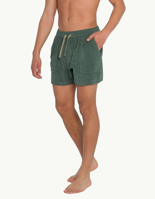 Versatile summer luxury shorts with a towel-like feel, ideal for beach getaways or nights out. Made from 100% certified organic cotton in green.