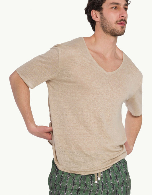 Experience elevated comfort with our Sand Pure Linen V-Neck T-Shirts. Made from the softest natural fibres, they provide lightweight breathability and a luxurious feel against the skin. In beige color with short sleeves, their high-end craftsmanship and relaxed fit offer effortless style for any occasion.