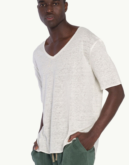 Experience elevated comfort with our Blanc Pure Linen V-Neck T-Shirts. Made from the softest natural fibres, they provide lightweight breathability and a luxurious feel against the skin. In white color with short sleeves, their high-end craftsmanship and relaxed fit offer effortless style for any occasion.