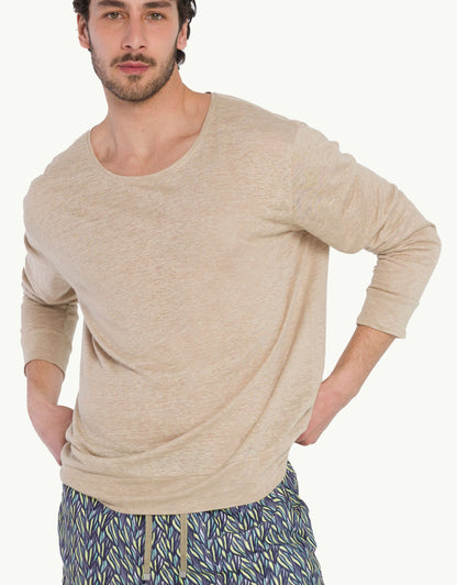 Discover luxury simplicity with our sand color Pure Linen Sweatshirt. Crafted from soft natural fibres, they offer lightweight comfort and breathability, ideal for warm days and evenings. In beige color with long sleeves, their high-end craftsmanship and loose fit add understated elegance to your style.