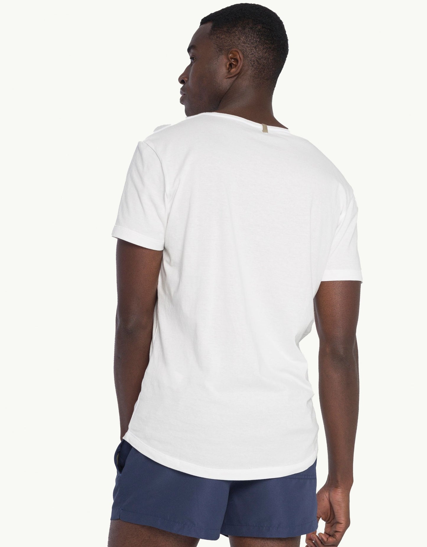 Explore sustainable fashion for men with our essential Unku Blanc T-shirt in white. Crafted for everyday luxury, our tees offer unmatched softness and all-day comfort. Stay cool in our breathable organic cotton tees, made from 100% organic cotton for sustainability and skin-friendly wear