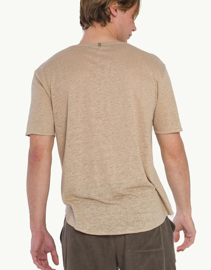 Experience elevated comfort with our Sand Pure Linen V-Neck T-Shirts. Made from the softest natural fibres, they provide lightweight breathability and a luxurious feel against the skin. In beige color with short sleeves, their high-end craftsmanship and relaxed fit offer effortless style for any occasion.