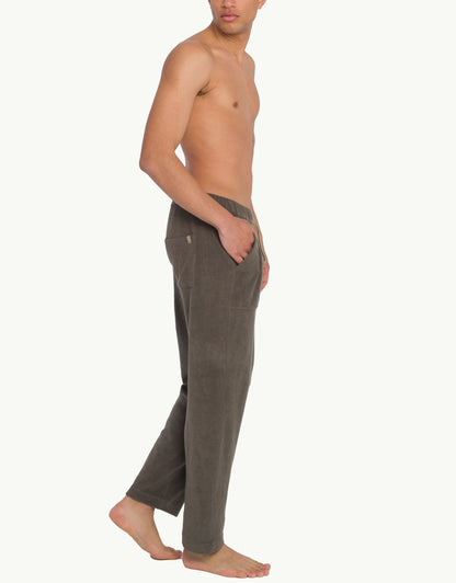 Versatile summer luxury pants with a towel-like feel, ideal for beach getaways or nights out. Made from 100% certified organic cotton in grey.