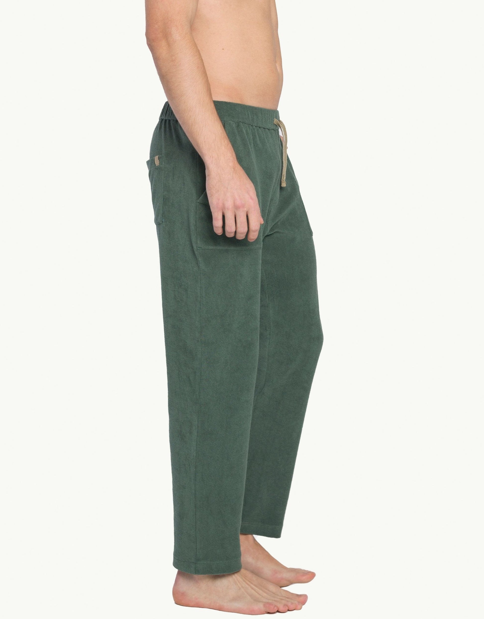Versatile summer luxury pants with a towel-like feel, ideal for beach getaways or nights out. Made from 100% certified organic cotton in green.