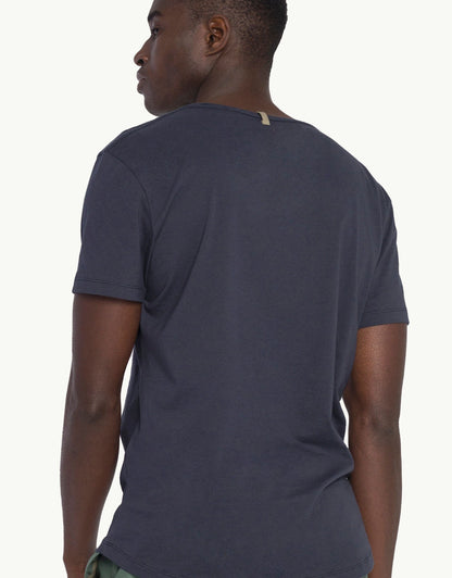 Explore sustainable fashion for men with our indigo color unku t-shirt. Crafted for everyday luxury, our tees provide unmatched softness and all-day comfort. Stay cool in our breathable organic cotton tees for men, made from 100% organic cotton to champion sustainability and skin-friendly choices.